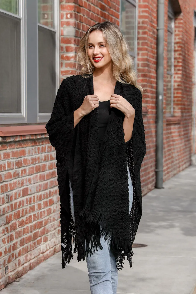 Knit Tasseled Ruanas.