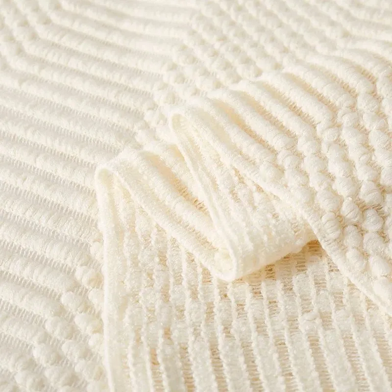 Tasseled textured knit throw blanket