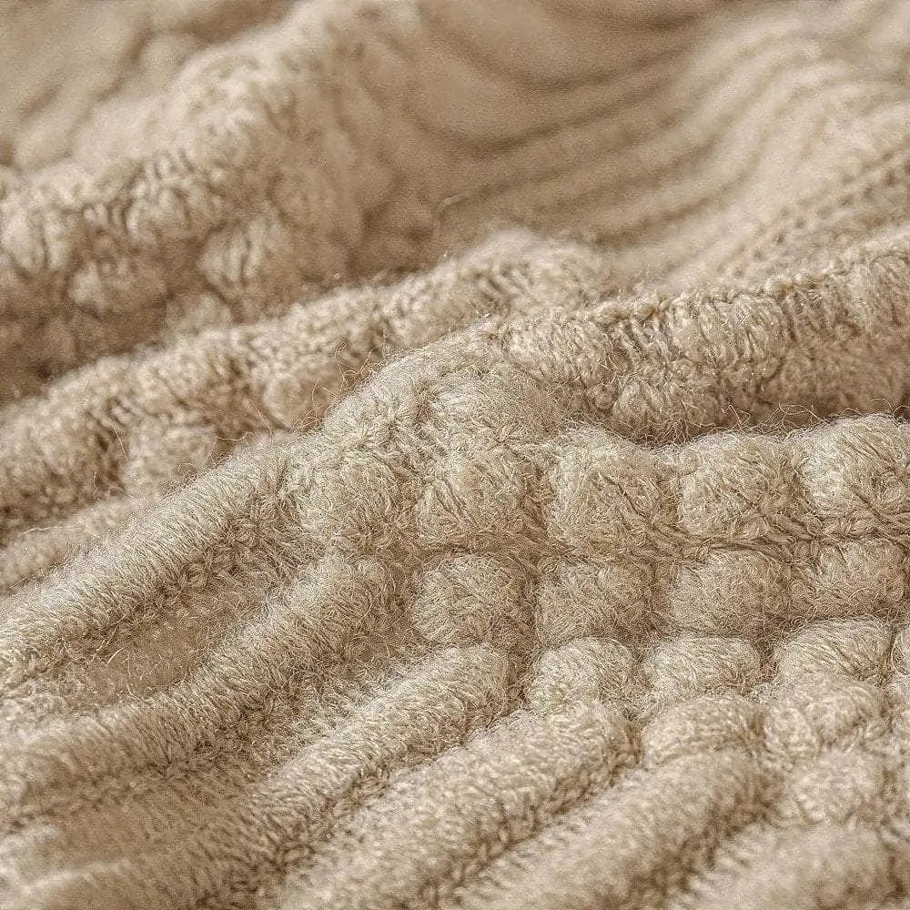 Tasseled textured knit throw blanket