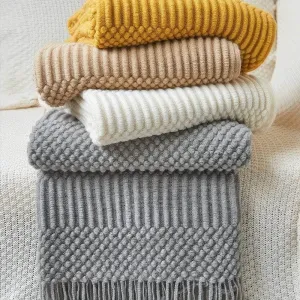 Tasseled textured knit throw blanket